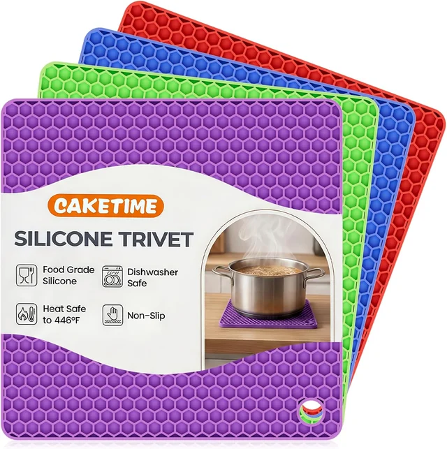 Four colorful square silicone trivet mats